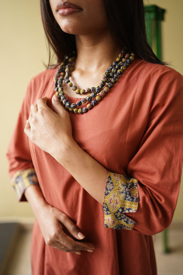 Terracotta Flared Kurta Set with Kalamkari Accents